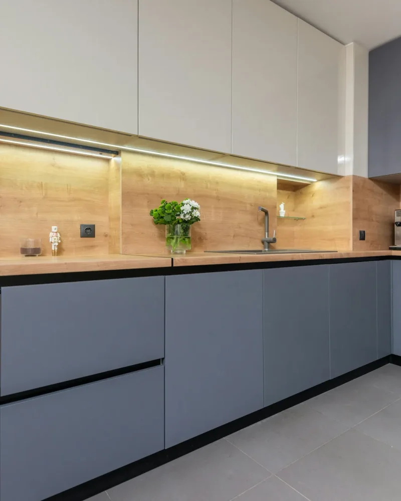 A complete transformation from a dark space to bright inviting kitchen featuring fresh grey cabinet in lynnwood