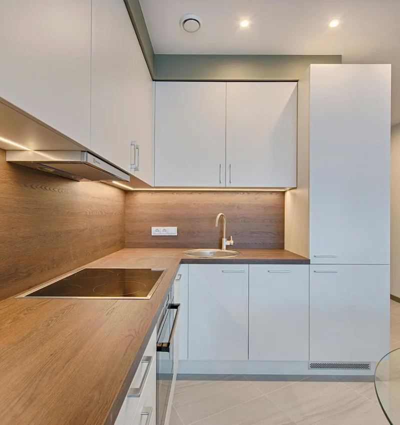 view of freshly installed subway tile back splash and under cabinets Led lighting completed modern kitchen in kirkland